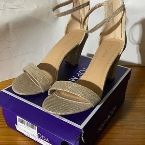Women’s Moda, size 9 heels. Brand new. Color is a “nude” sparkle color.